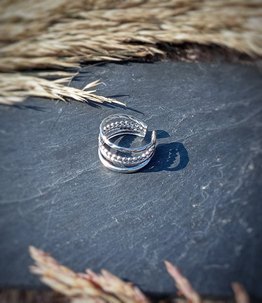 Anillo de acero triple banda