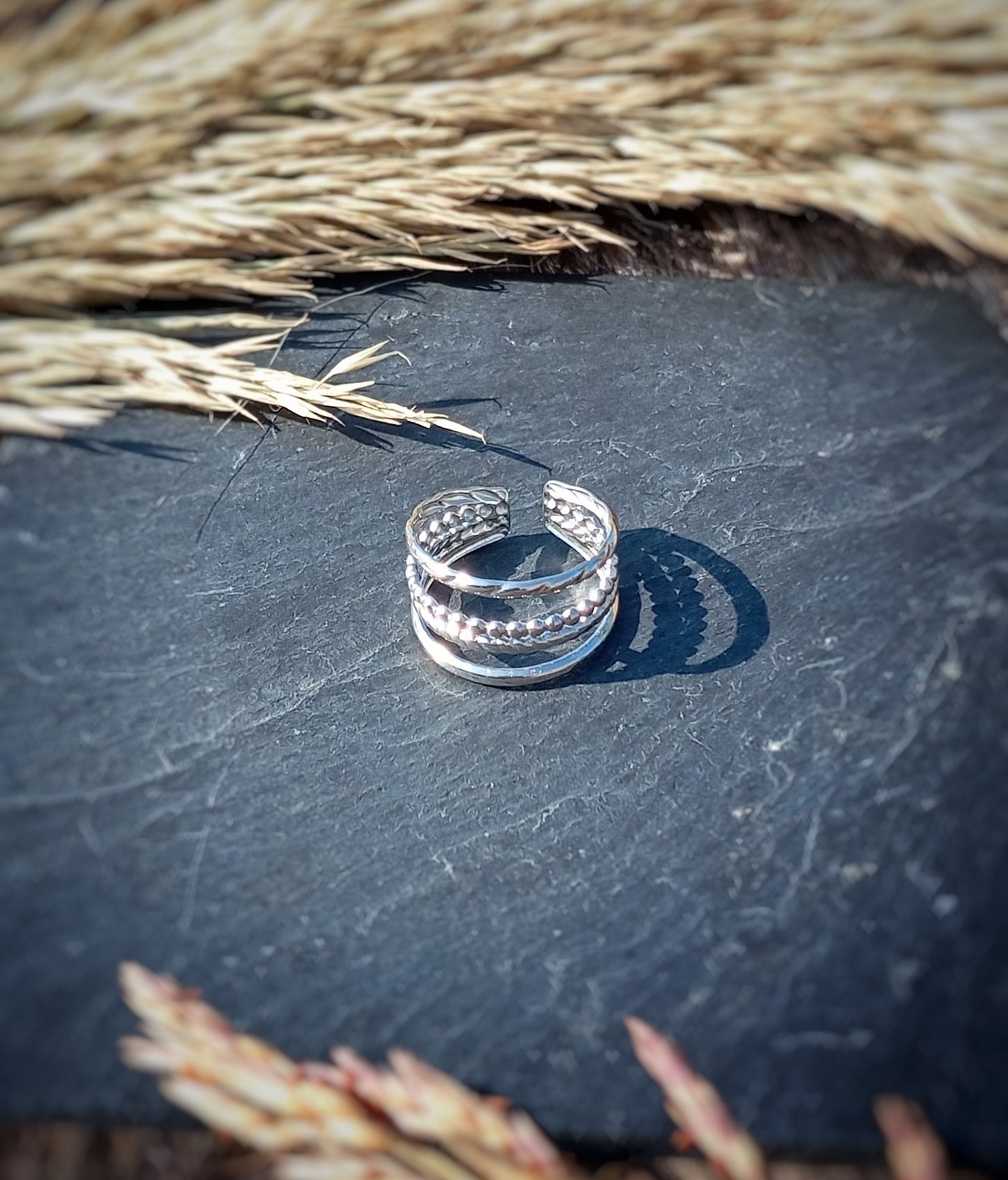 Anillo de acero triple banda